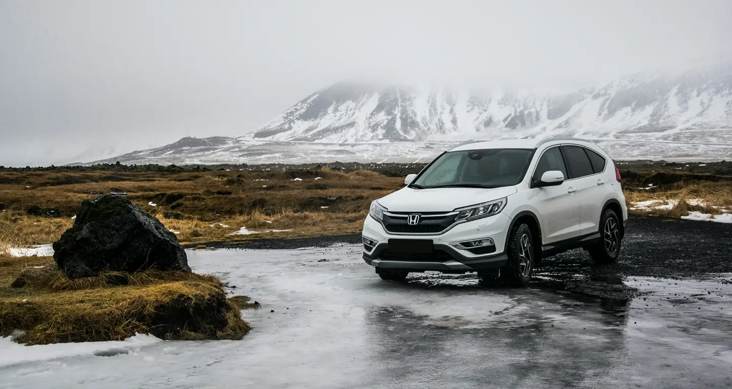 Snowy mountain landscape with a Honda CR-V